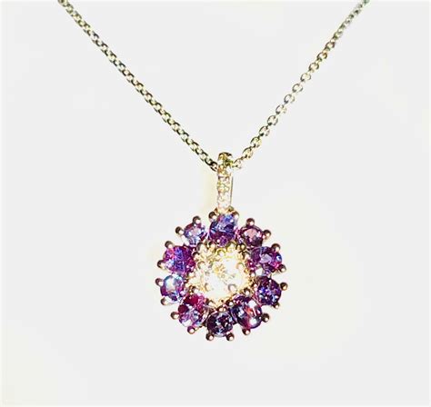 Alexandrite Floral Cluster And Diamond Pendant In White Gold