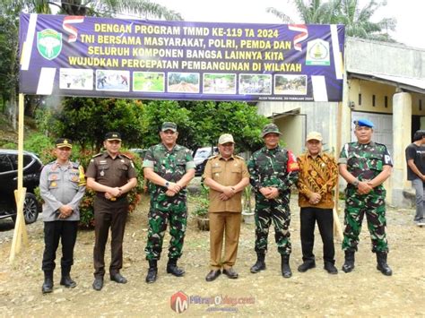 Pj Bupati Asra Resmikan Dan Tandatangani Serah Terima TMMD Reguler Ke