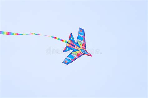 A Color Kite Flying Against a Blue Sky. Stock Photo - Image of game ...