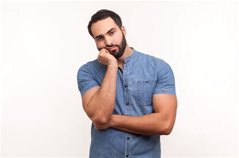 Premium Photo Bored Upset Man With Beard In Blue Shirt Leaning Head