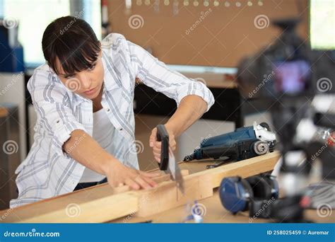 Female Carpenter Using Electric Sander For Wood Stock Image Image Of