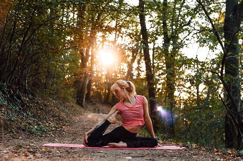 Woman Doing Yoga In Nature Del Colaborador De Stocksy Dimitrije