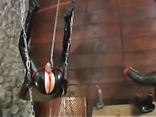 Latex Couple Strapon Fucking In Sex Swing