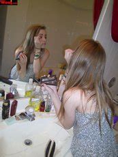 Brunette Babe Puts On Make Up Before Going Out With Her Girls Photos