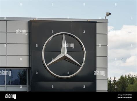 Mercedes Benz logo on the wall of a car dealer in Lahti, Finland. July ...