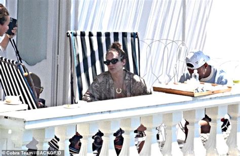 Jennifer Lopez Shows Off Her Famous Curves In A Skimpy Red Bikini While Soaking Up The Sun On