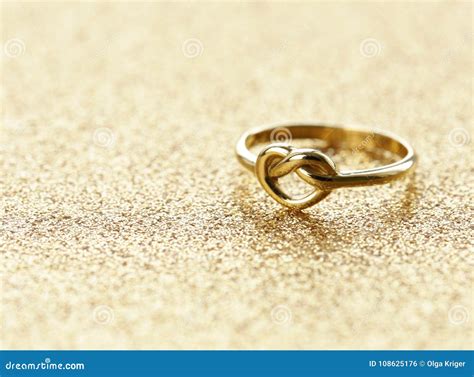 Gold heart shaped ring stock photo. Image of celebration - 108625176