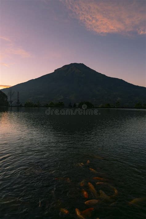 Sunrise with Mount Sumbing with Lake Surface on the Foreground Stock ...