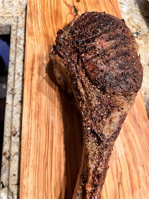 Homemade Tomahawk Steak With Chimichurri Compound Butter Mashed Potatoes And Brussels Sprouts