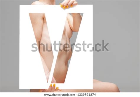 Nude Female Body Behind Stencil Letter Stock Photo 1339591874 Shutterstock