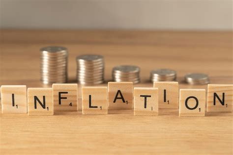 Premium Photo The Word Inflation On Wooden Cubes On A Wooden