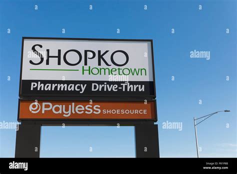 A Logo Sign Outside Of A Shopko Hometown Retail Store In Kiel