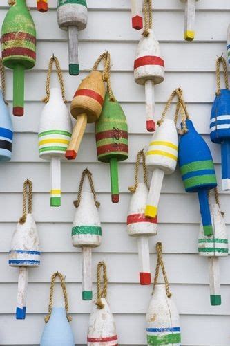 Wooden Lobster Buoys Hang On A Wall In Stonington Maine Lobster