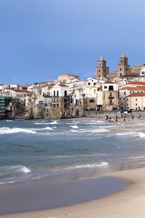 Beach and old town, Cefalu stock image. Image of rocks - 18712591