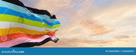 Pride Flag Waving In The Wind At Cloudy Sky Freedom And Love Concept