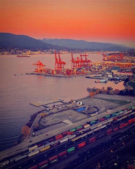 Premium Photo High Angle View Of Commercial Dock Against Sky During