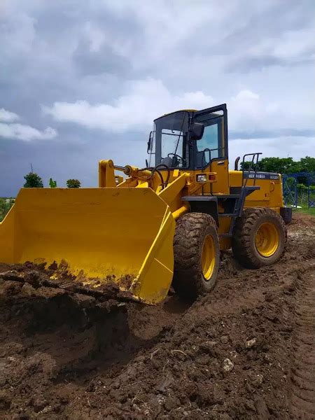 Sewa Wheel Loader 3 Kubik Di Surabaya Rental OMO Alat Berat