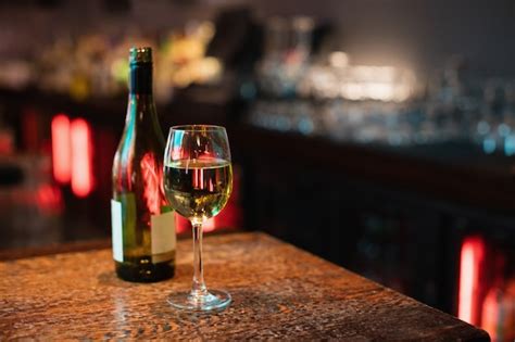 Free Photo Glass Of Red Wine On Bar Counter