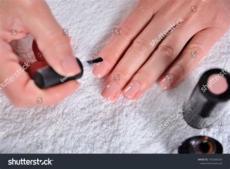 Woman Applying Nude Natural Nails Polish Stock Photo Shutterstock