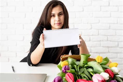 Small Business Concept Spring Holidays Business Woman Holding Blank