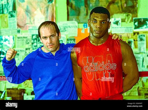 Mike Tyson (R) with trainer Kevin Rooney at Cus D'Amato's gym in ...