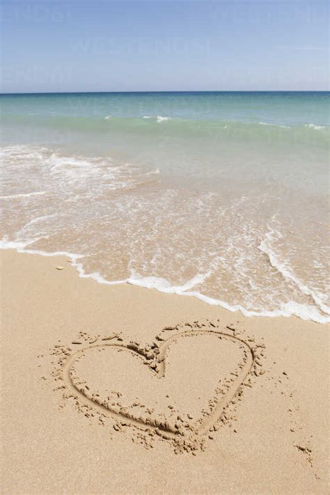 Portugal View Of Heart Shape In Sand Stock Photo