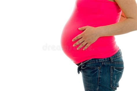 Cheerful Pregnant Brunette Girl In Big Belly Posing Isolated On White Background Stock Image
