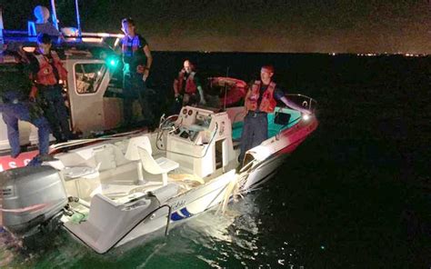 U S Coast Guard Rescues 10 People Recovers 2 Bodies After Fatal Boat Collision Near Key