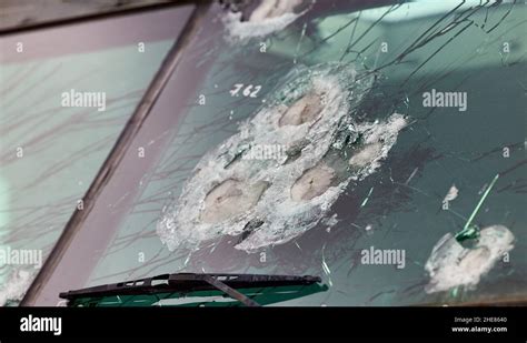 Armored Glass After Of A Direct Hit From An Automatic Weapon Safety Glass After Being Hit By A