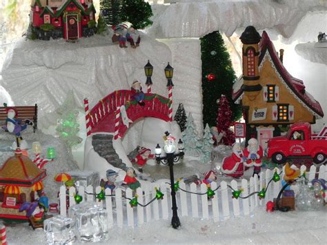 Dept 56 North Pole Elf village | Christmas village display, Diy christmas village platform ...