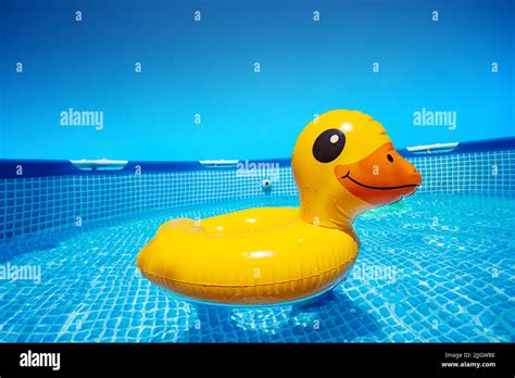 Inflatable Cute Surprised Yellow Duck Swim In The Pool Stock Photo Alamy