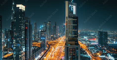 Dubai downtown night panorama with modern buildings and illuminated ...