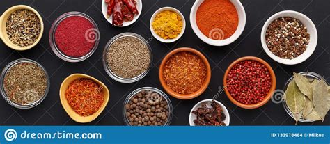 Spice Background Colourful Seasonings In Bowls Top View Stock Photo