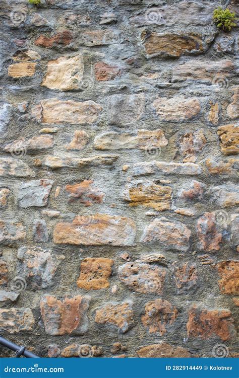 A Textura Da Velha Pedra De Alvenaria Do Antigo Castelo Enferrujado E