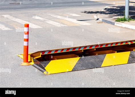 Road Barrier With Yellow And Black Striped Caution Pattern Road Fence