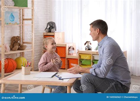 Child Psychotherapist Working with Little Girl Stock Photo - Image of ...