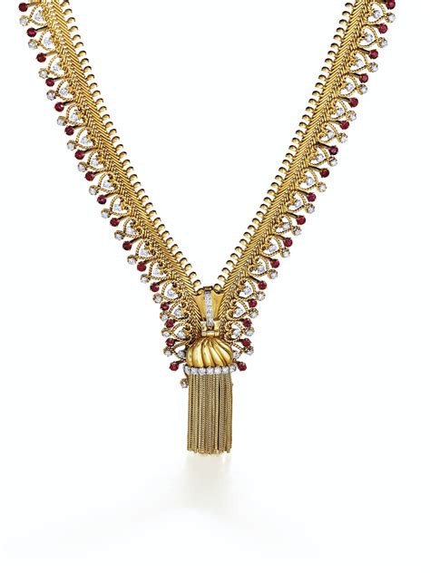 An Iconic Retro Gold Ruby And Diamond Zip Necklace Van Cleef