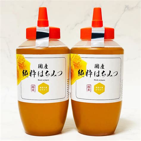 神戸養蜂場 はちみつのお店はちみつ トンガリ 国産 純粋 百花蜜 非加熱 1kg ギフト 蜂蜜 贈り物 ハチミツ おすすめ 無添加 容器 は