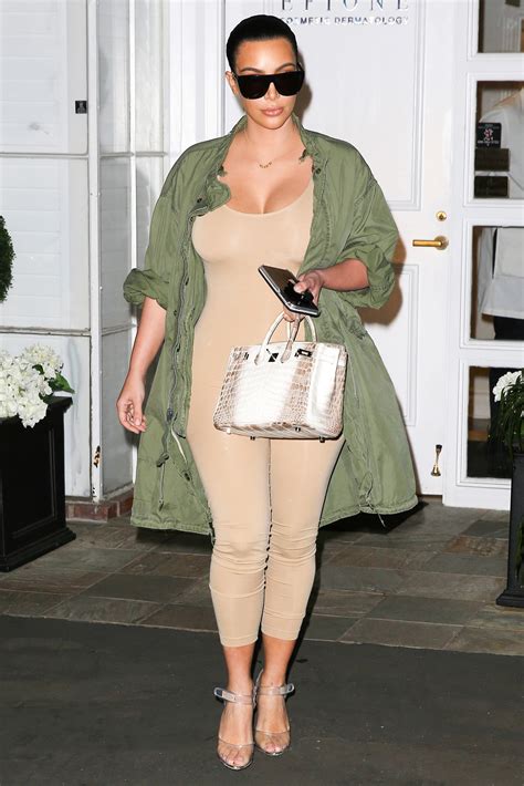 Kim Kardashians Post Baby Body On Full Display In Nude Bodysuit