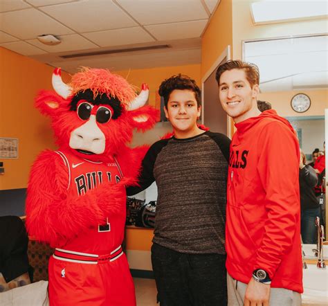 Ryan Arcidiacono and Benny the Bull Visit Patients at Advocate Children