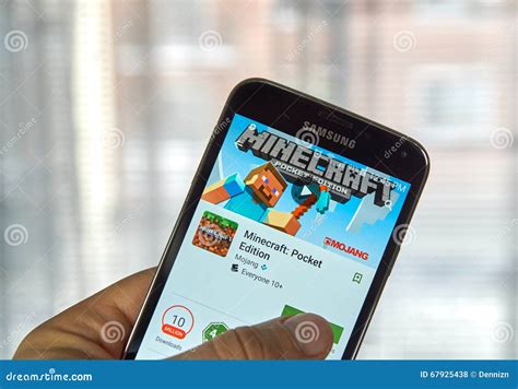 Minecraft mobile game. editorial stock photo. Image of holding - 67925438