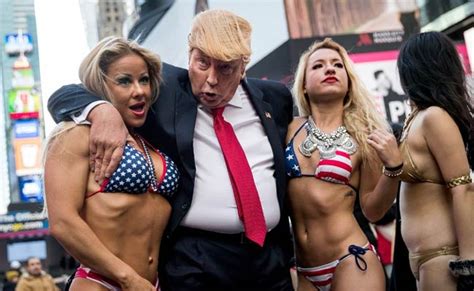 Bikini Clad Models Surround Fake Donald Trump In New York City Stunt