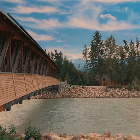 Premium Photo Bridge Over River Against Sky