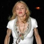Madonna Flashes Her Boob In Concert