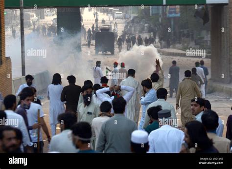 PESHAWAR PAKISTAN MAY 09 Police Fire Tear Gas To Disperse