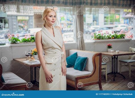 Blonde Beautifull Businesswoman Posing In A Restaurant Stock Image