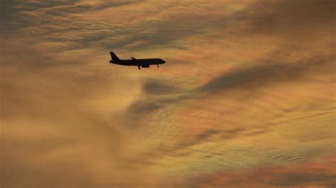 Silhoutte Of Plane Flying Over Sunset Sky Stock Footage SBV-347403305 ...