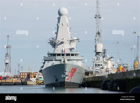 HMS Dragon (D35), pictured alongside at her home port of Portsmouth ...