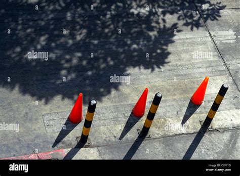 Traffic cones and stanchions in a parking lot, Thailand Stock Photo - Alamy