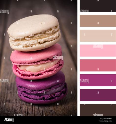 French Macaroons On An Old Wood Background In A Colour Palette With